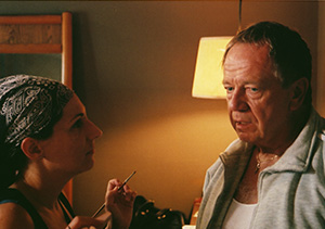 photo by Jason Thirlaway Yvonne Ortiz touches up the Bishop, Sam Anderson, on the set of Dirty Habit.